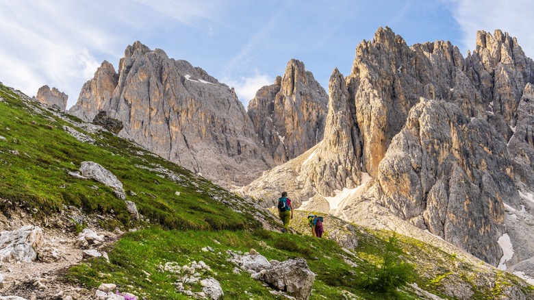 Tourists climbing Italy's Dolomites