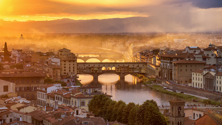 Sunset and mist along the Ponte Vecchio in Florence