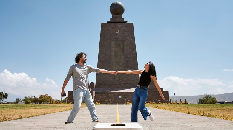 Couple posing Mitad del Mundo