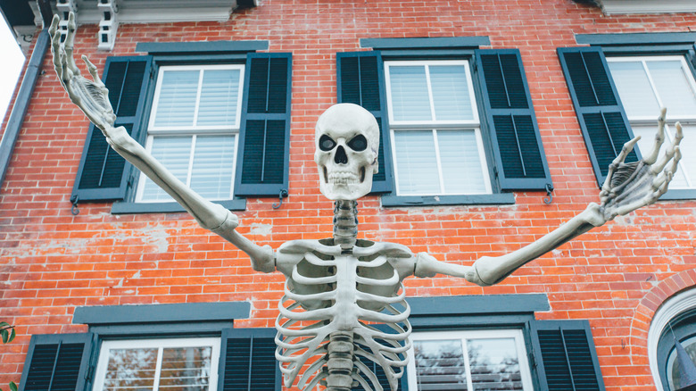 Skeleton in front of Salem building