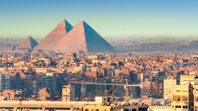 Great Pyramids behind cityscape