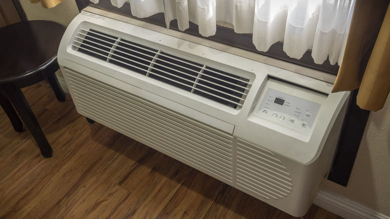 An air conditioner in a hotel room.