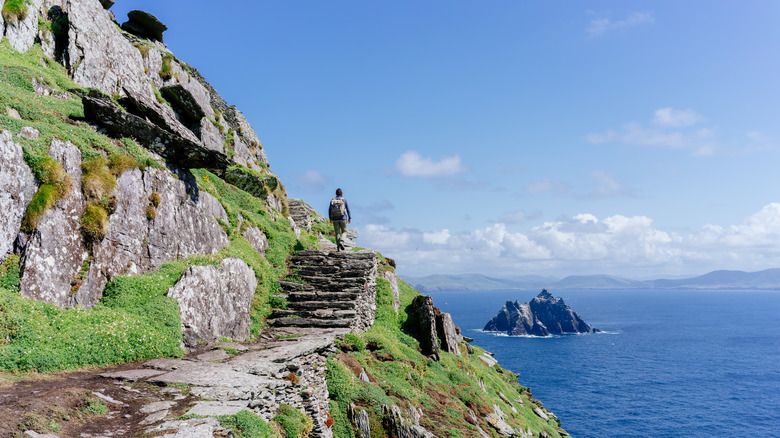 tourist walking up path to monastery, Skellig Michael