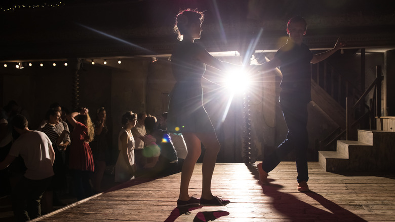 couple dancing on a stage