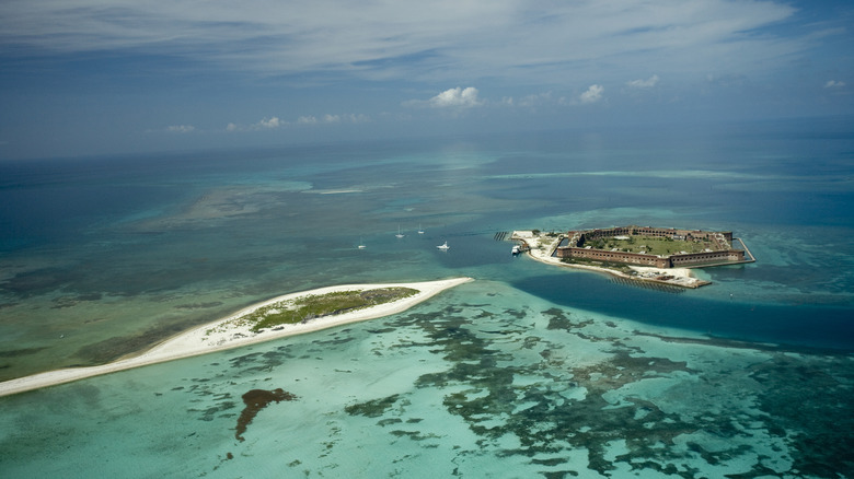 Aerial view of isolated islands and blue ocean waters