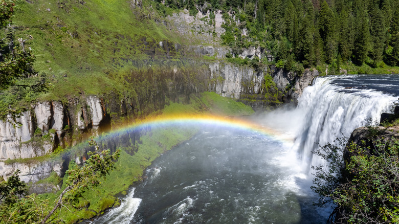 A rainbow forms over Idaho's Upper Mesa Falls