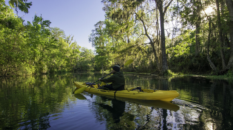 Kayaker exploring a Florida spring