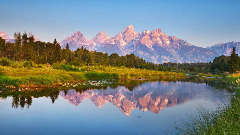 Grand Teton mountain range in the background with Snake River in the front