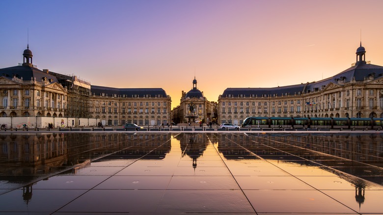 Place de la Bourse at sunset reflected in a pool in Bordeaux, France