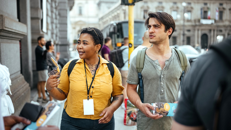 Tour guide with a small group in Italy