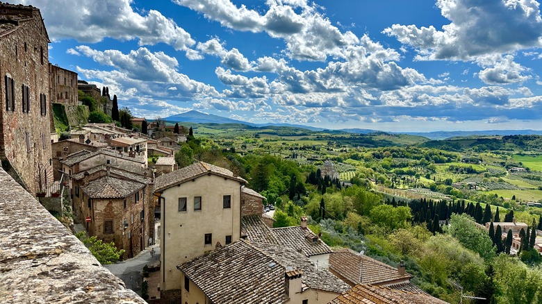 Tuscan hill town over fields