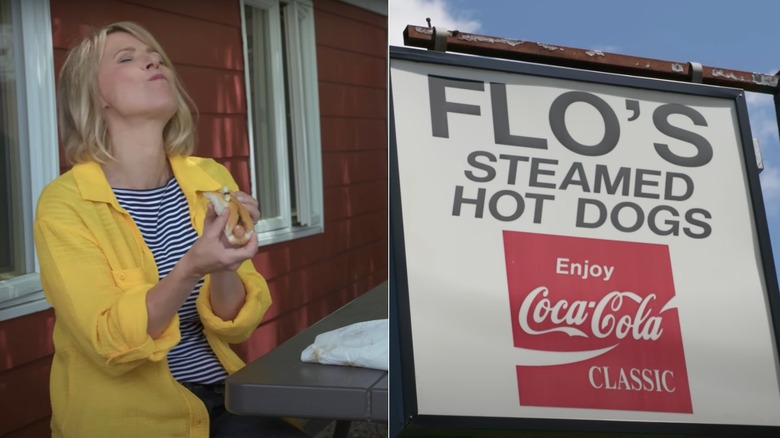 Samantha Brown enjoying a hot dog from Flo's & Flo's Steamed Hot Dogs sign