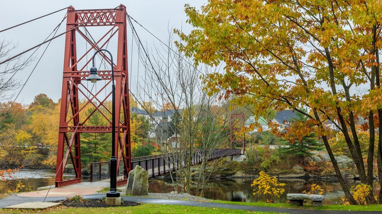 Swing bridge over river