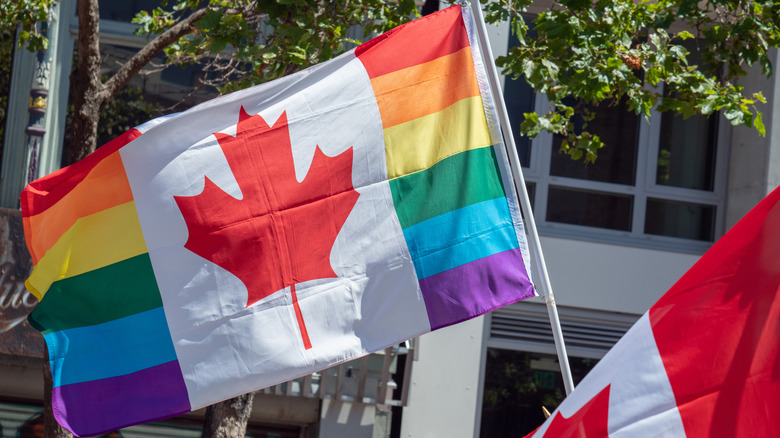 Canadian flag with rainbow Pride colors