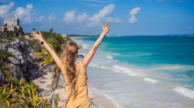 exuberant Quintana Roo beachfront vacationer