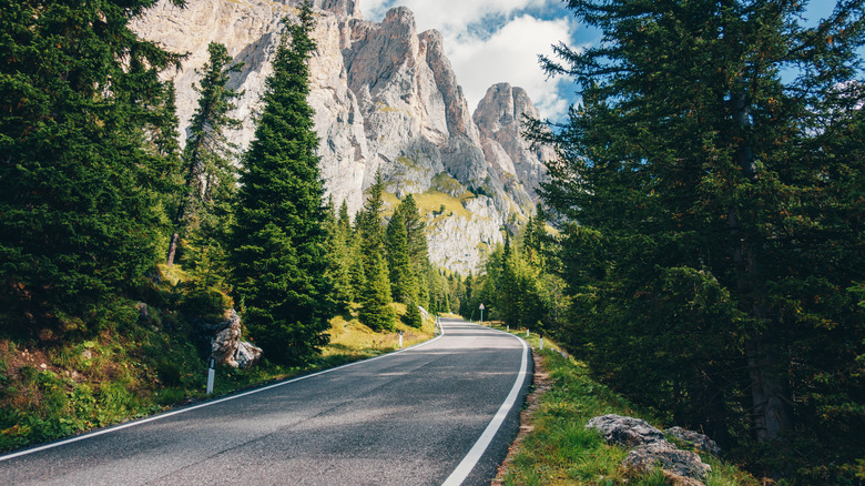 Road going through Dolomites in Italy