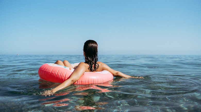 A woman floating on the sea