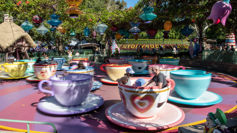 People riding the Mad Tea Party ride in Disneyland