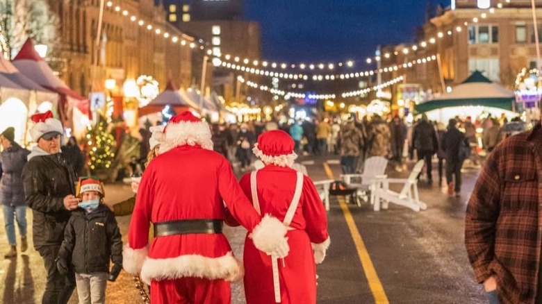 Santa and Mrs. Claus walking at the Christmas Market in Charlottetown