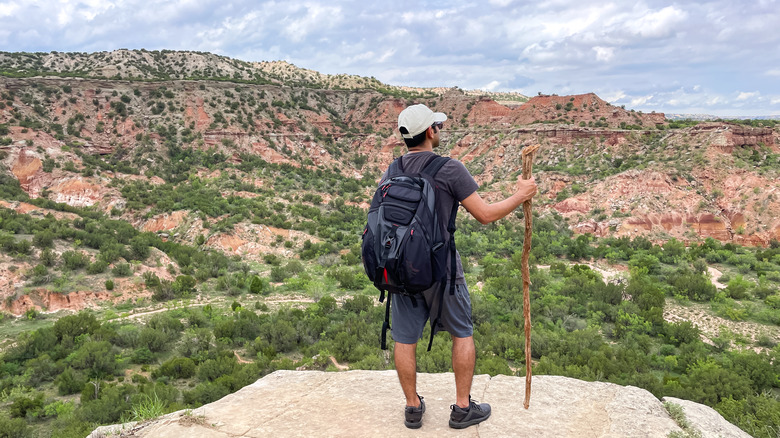 Hiker taking in the view at Palo Duro Canyon