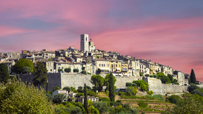 Pink sky behind the Saint-Paul-de-Vence village in Southern France