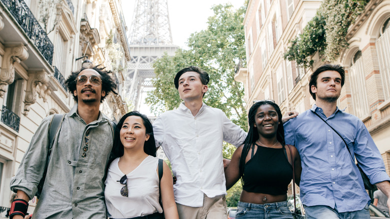 Friends on a tour in Paris near Eiffel Tower