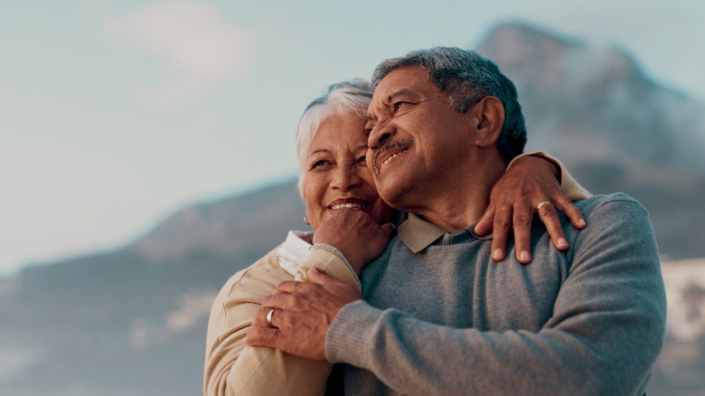 Senior couple smiling on vacation