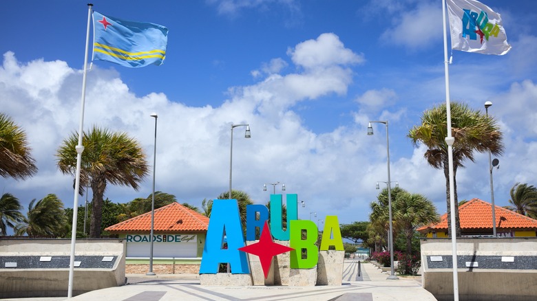 Aruba sign and flag in Oranjestad