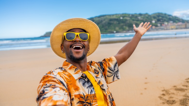 Man wearing sunglasses at beach