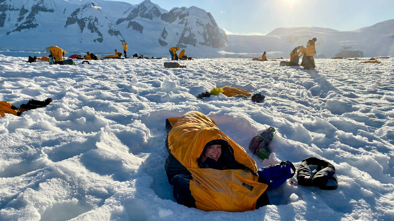 Campers wrapped in special sleeping bags in Antarctica