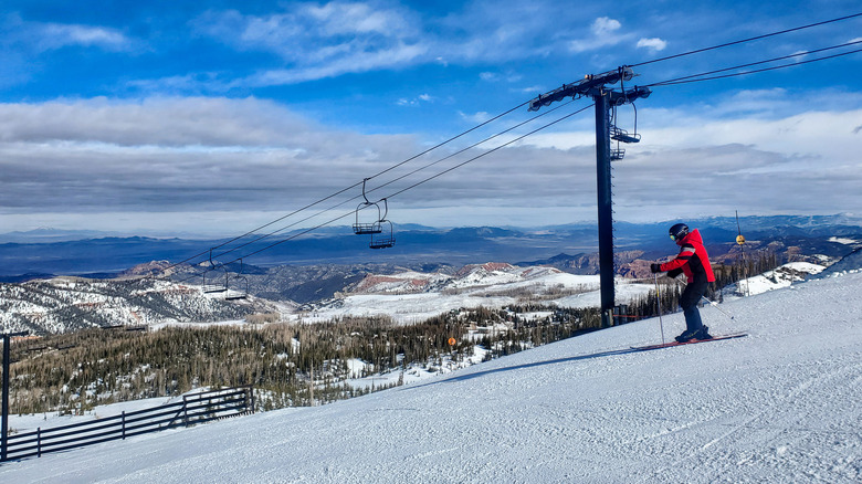 Skiier and chairlift at Brian Head Ski Resort