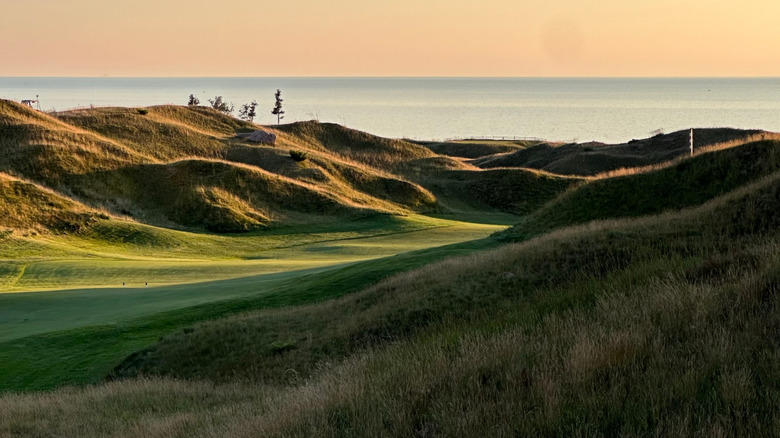 Arcadia Bluffs golf course at sunset