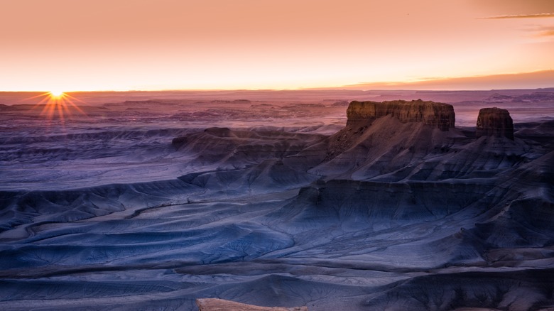 Moonscape Overlook with the sun rising in the background