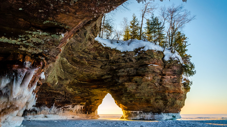 An ice cave on a lake