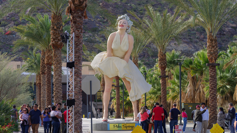 Tourists crowded at the feet of the Forever Marilyn statue in Palm Springs