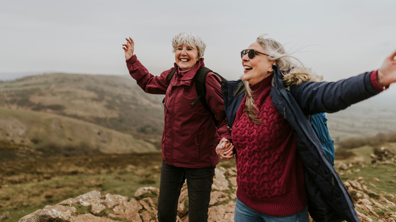 Senior travelers enjoying a hike in the mountains