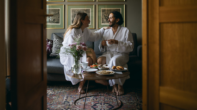 A couple eating in a hotel