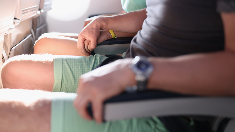 anxious airplane passengers hands