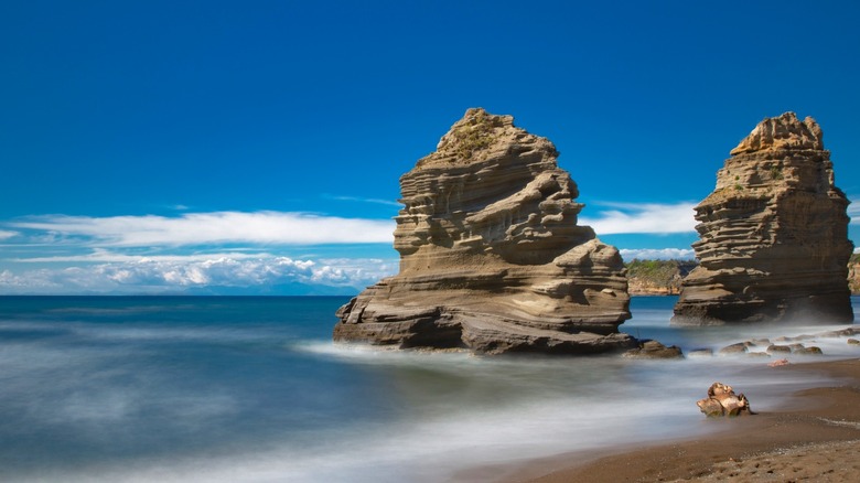 Large rock formations at Ciraccio Beach.