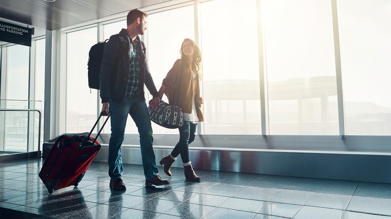 Couple traveling together at the airport