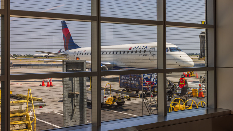 Delta aircraft parked outside window