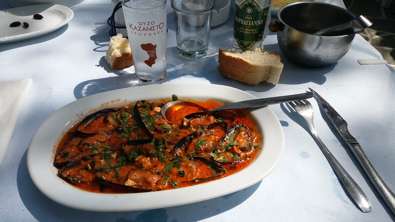 Mussels in a tomato sauce broth at a Greek restaurant