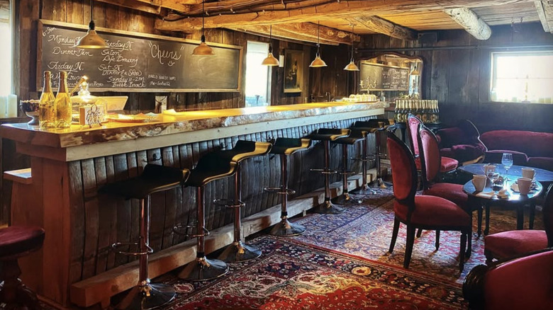 Bar and couches inside the Karlo Estates speakeasy