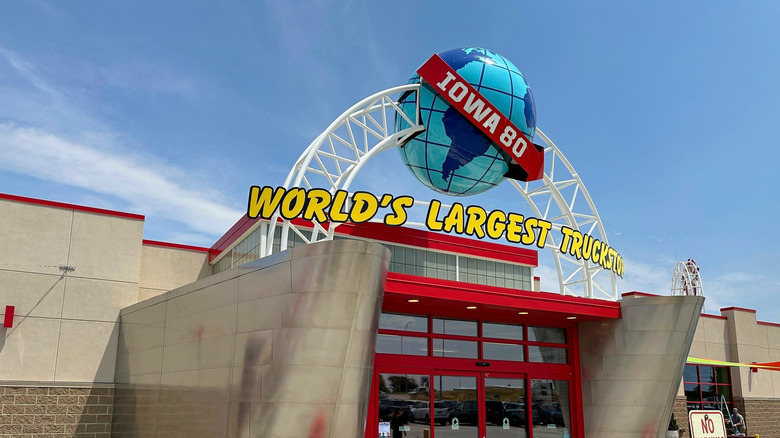 The entrance to Iowa 80 truck stop with a globe over the roof