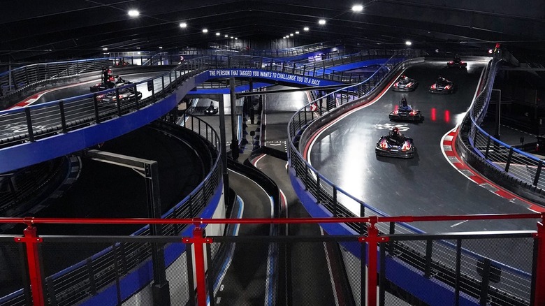 carts racing on the Supercharged Entertainment go-kart track