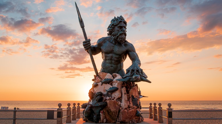 The statue of Neptune on Virginia Beach in Virginia at sunset