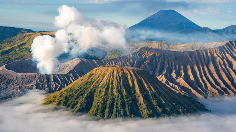 Volcano above the clouds in Java, Indonesia