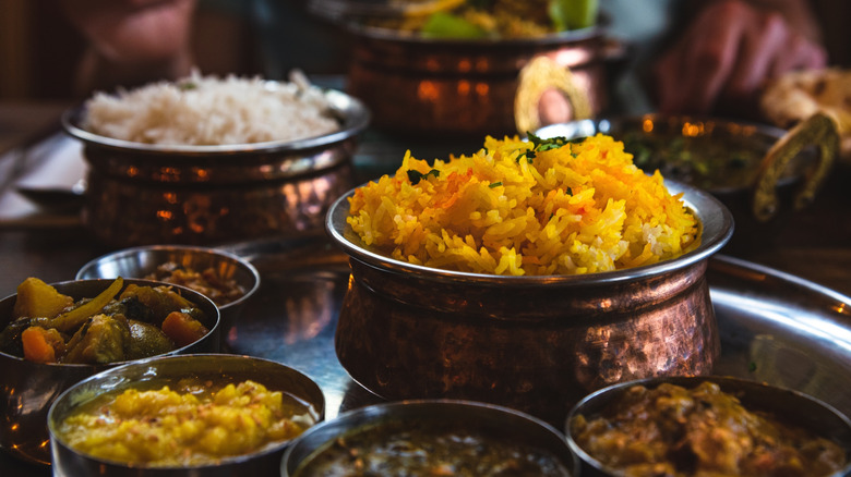 A typical vegetarian thali meal with rice and vegetable dishes