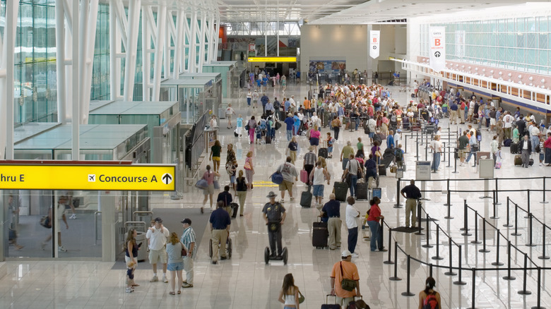 Crowds of people at an airport