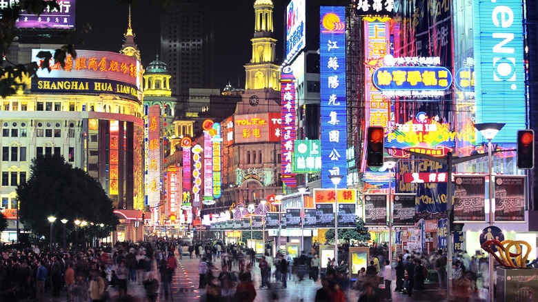 Buzzing Shanghai night scene with neon lights